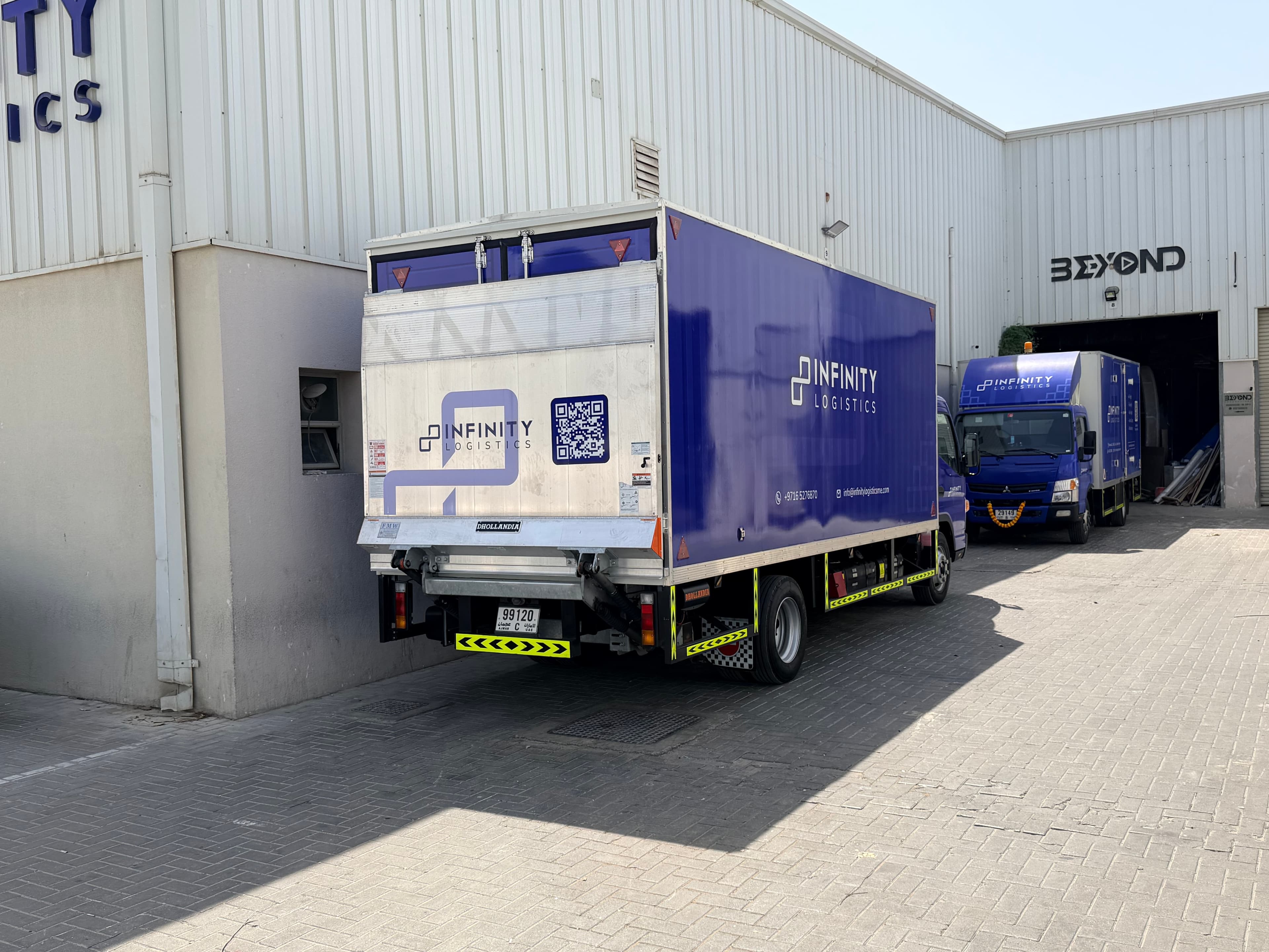 Infinity Logistics fleet at loading dock