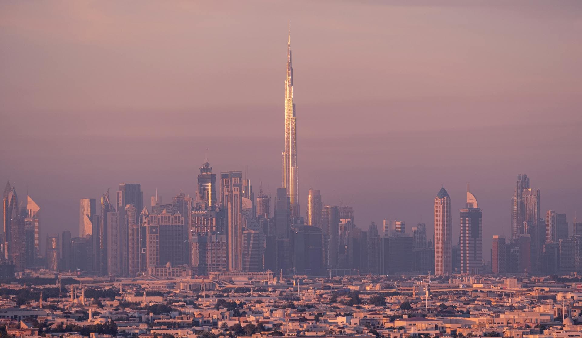 Dubai skyline with Burj Khalifa at dusk — Infinity Logistics premium services