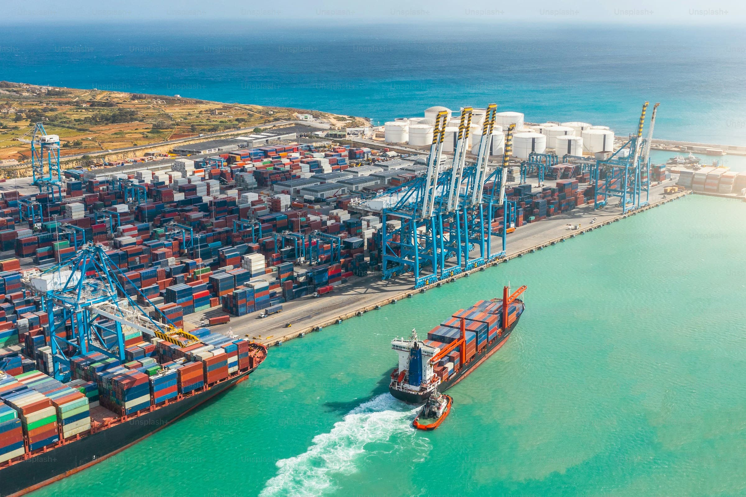 Aerial view of a major container port with cargo ships — Infinity Logistics global operations
