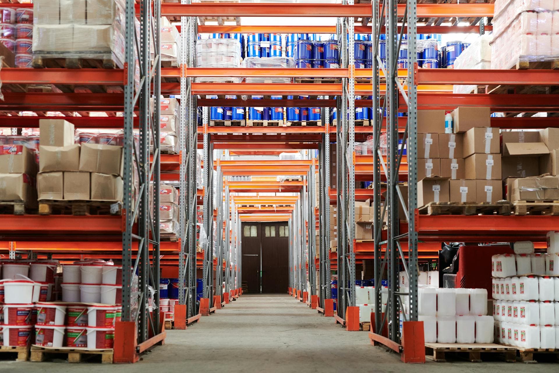 Warehouse with orange racking system — Infinity Logistics retail distribution solutions