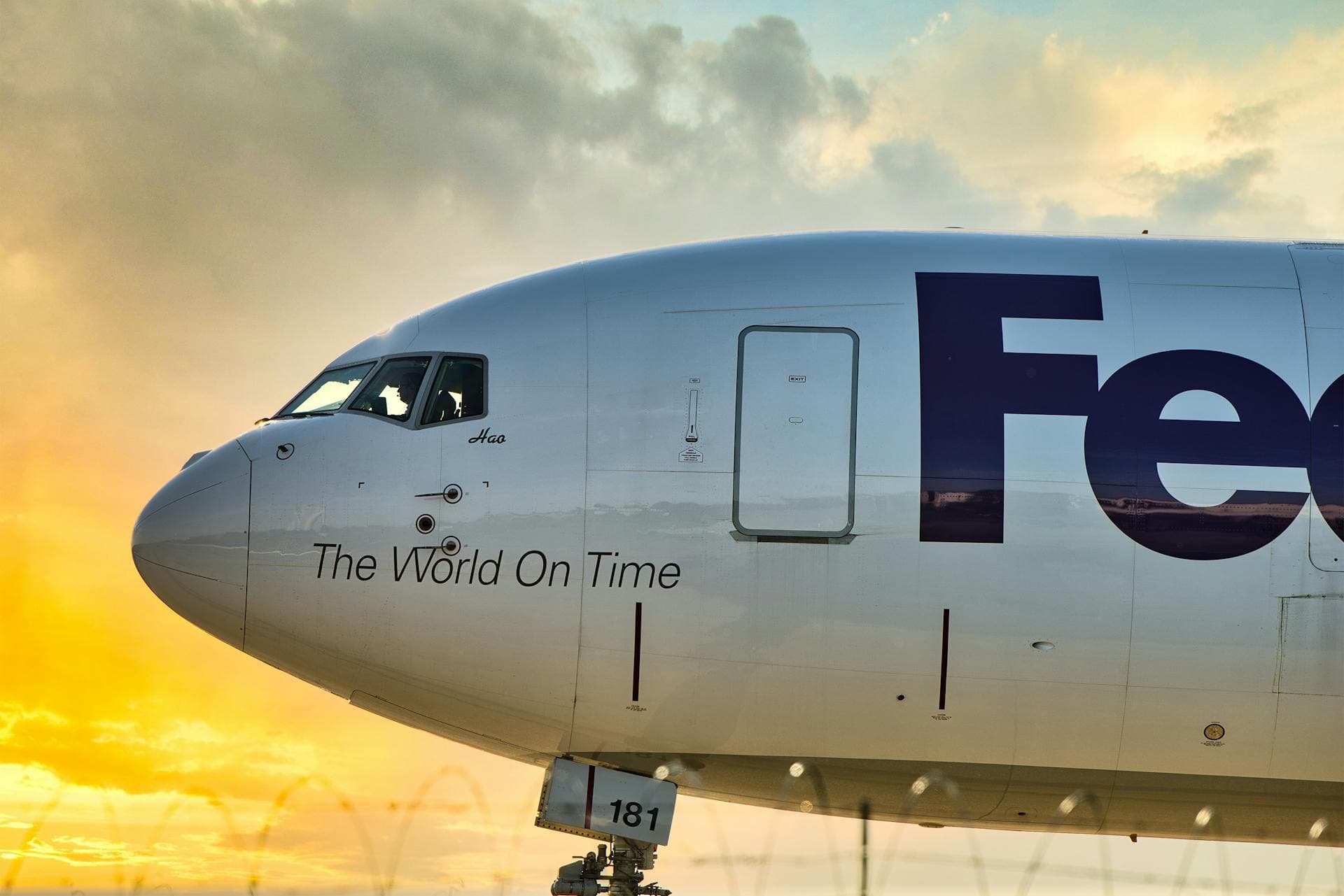 FedEx cargo aircraft at sunset — Infinity Logistics premium air freight